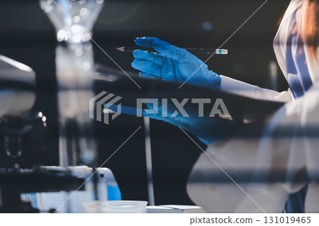 Researchers working in the clinical laboratory 131019465