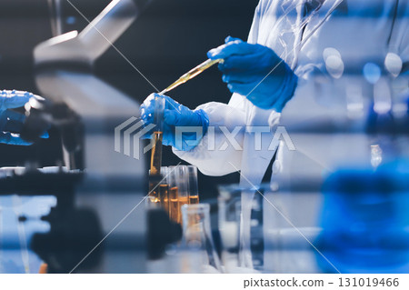 Researchers working in the clinical laboratory 131019466