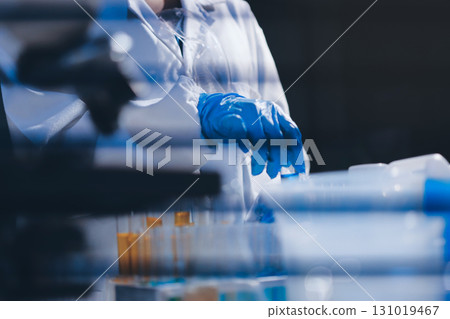 Researchers working in the clinical laboratory 131019467