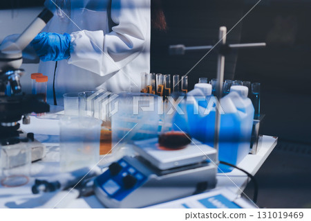 Researchers working in the clinical laboratory 131019469