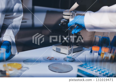 Researchers working in the clinical laboratory Researchers working in the clinical laboratory 131019471