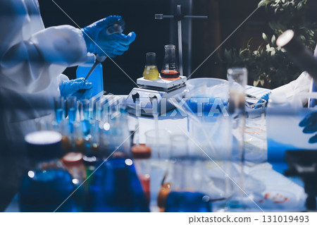 Researchers working in the clinical laboratory Researchers working in the clinical laboratory 131019493
