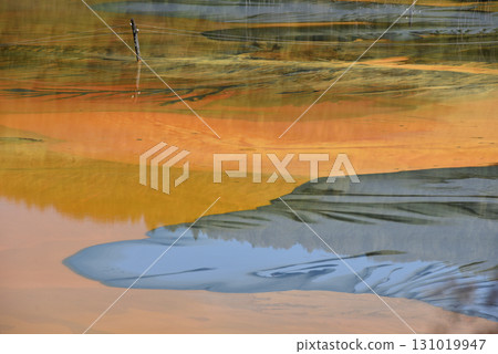 Surreal natural patterns. Residual gold mining leach waters polluting the environment 131019947
