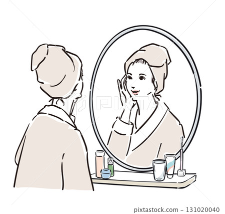 A woman in a bathrobe standing in front of a mirror A woman in a bathrobe standing in front of a mirror 131020040