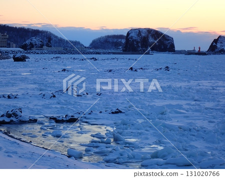 Shiretoko drift ice and sunset 131020766