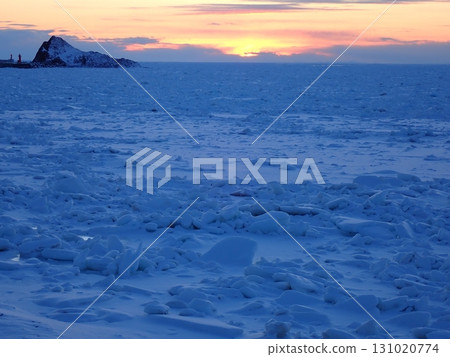 Shiretoko drift ice and sunset 131020774