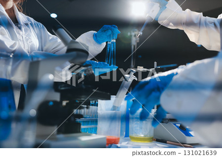 Researchers working in the clinical laboratory 131021639