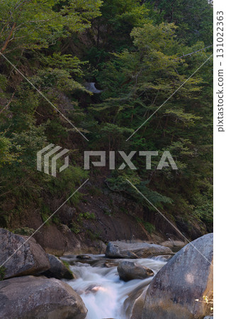 Shosenkyo River flowing in summer Shosenkyo River flowing in summer 131022363