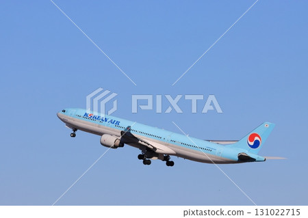 Korean Air plane taking off, passenger plane ascending Korean Air plane taking off, passenger plane ascending 131022715