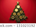 Christmas tree made of bitcoin coins, red background 131023192