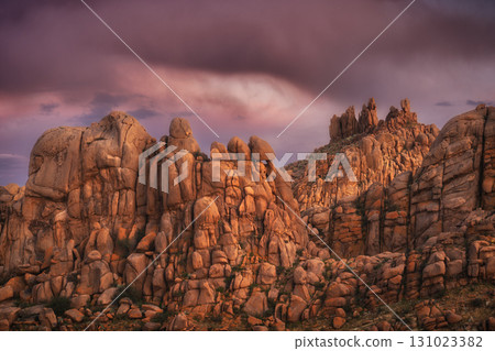 A Stunning and Beautiful Desert Landscape that Features Vibrant Sunset Lighting A Stunning and Beautiful Desert Landscape that Features Vibrant Sunset Lighting 131023382