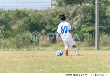Junior high school boys playing soccer 131023806