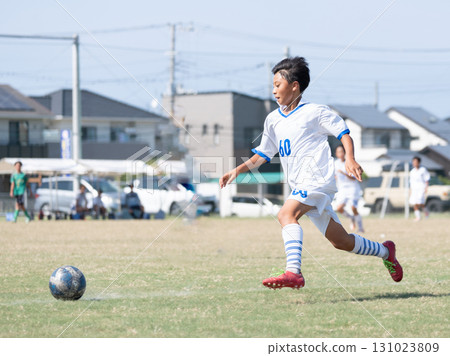 Junior high school boys playing soccer Junior high school boys playing soccer 131023809