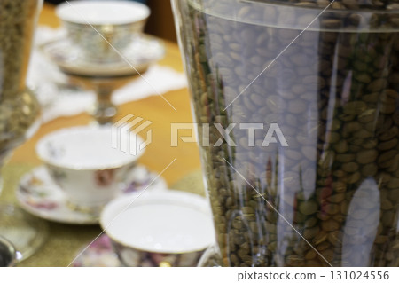 Coffee beans showing various stages of roasting from raw 131024556