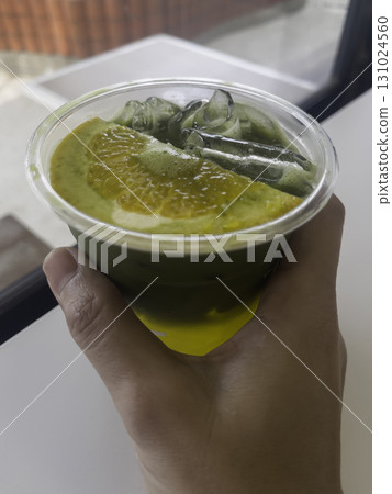 Pure matcha tea with orange juice healthy drink 131024560