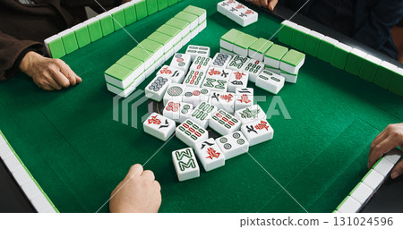 Chengdu, Sichuan, China. Men Playing Mahjong At Automatic Mahjong Table. Friendly Playing. People Playing Mahjong. Hands Of Mahjong Players. Live Game, Close Up View. Asian Culture. Travel China Chengdu, Sichuan, China. Men Playing Mahjong At Automatic Mahjong Table. Friendly Playing. People Playing Mahjong. Hands Of Mahjong Players. Live Game, Close Up View. Asian Culture. Travel China 131024596