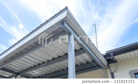 AI-generated image highlights the structural beauty of a simple metal folded-plate carport roof 131025151