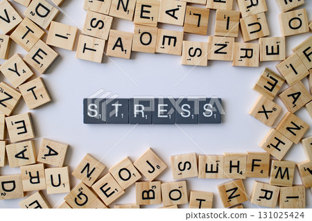 Stress word in wooden cube blocks, mental pressure concept, anxiety and tension idea, health and psychology theme Stress word in wooden cube blocks, mental pressure concept, anxiety and tension idea, health and psychology theme 131025424
