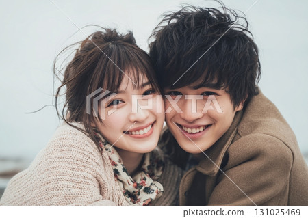 Cuddling young couple 131025469