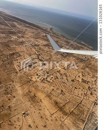 Overview of the Djerba region in Tunisia from an airplane during a scenic flight over its arid 131026165