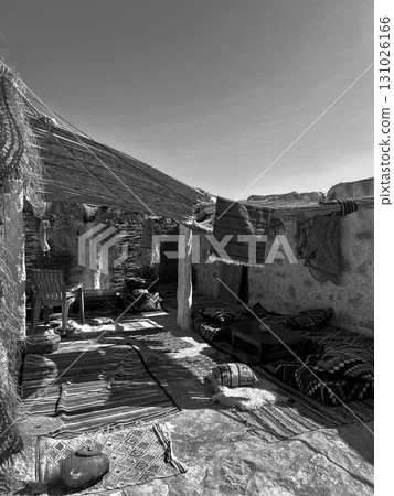 Exploring the troglodyte village of Qirmisah in Tataouine with cozy tea salon ambiance Exploring the troglodyte village of Qirmisah in Tataouine with cozy tea salon ambiance 131026166