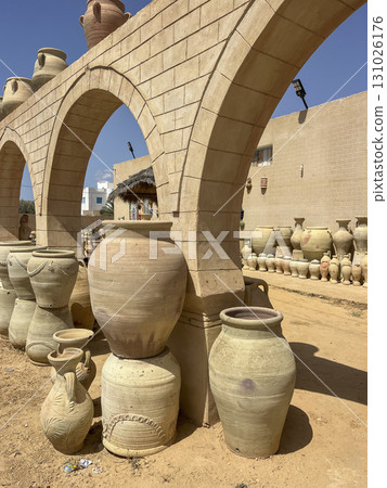 Explore traditional pottery at the Guellala shop in Djerba, Tunisia amid stunning desert scenery Explore traditional pottery at the Guellala shop in Djerba, Tunisia amid stunning desert scenery 131026176