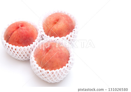 Peaches wrapped in cushioning material Copy space Peaches wrapped in cushioning material Copy space 131026580