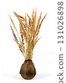 Vase with flowers on a white background. 131026898