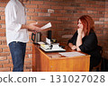 Woman in the office. 131027028