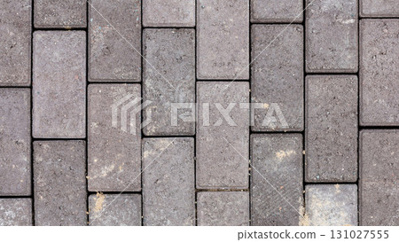 Close-Up Aerial View of Decorative Paving Stones, Showcasing Unique Patterns and Textures for Urban Landscaping and Outdoor Design 131027555