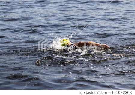 Swimmer Splashing Through The Great South Bay on a Sunny Day Close Up 131027868