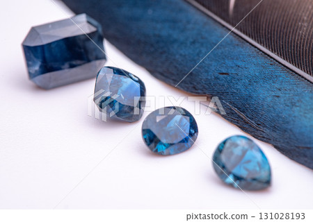 A blue stone is on a white background 131028193