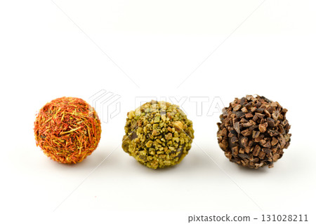 Three different colored balls, one of which is brown Three different colored balls, one of which is brown 131028211