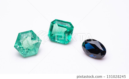 Three different colored gems are shown on a white background Three different colored gems are shown on a white background 131028245