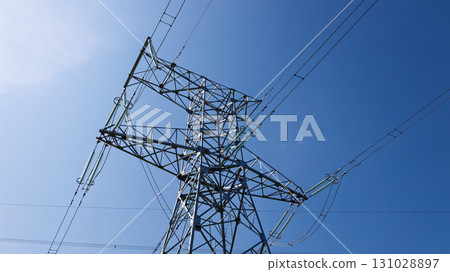 Steel Lattice Power Pylon with Overhead Electricity Cables 131028897