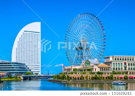 Yokohama cityscape in Japan, with views of Pacifico Yokohama, the Ferris wheel, and Anniversaire Minatomirai Yokohama Yokohama cityscape in Japan, with views of Pacifico Yokohama, the Ferris wheel, and Anniversaire Minatomirai Yokohama 131029281