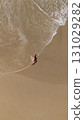 Pregnant Woman Relaxing by the Ocean Aerial Beach Photography 131029282