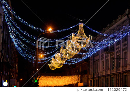 Christmas lights on a city streets. Christmas urban decorations Christmas lights on a city streets. Christmas urban decorations 131029472