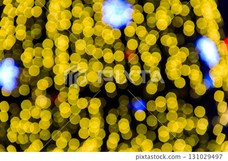 Festive multicolored blurred abstract background. Christmas lights bokeh background Festive multicolored blurred abstract background. Christmas lights bokeh background 131029497