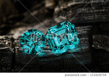 Two blue gems are on a rock Two blue gems are on a rock 131029734