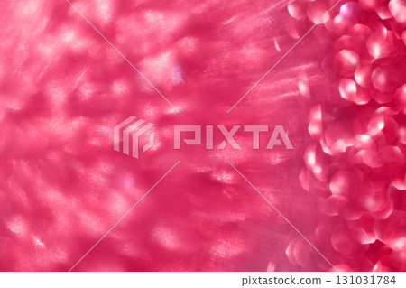 Abstract macro close up of shimmering pink bokeh light pattern with motion Abstract macro close up of shimmering pink bokeh light pattern with motion 131031784