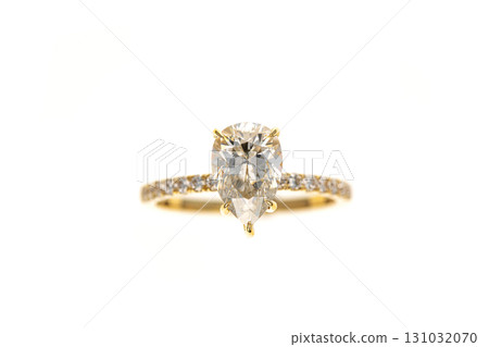 A gold and white diamond ring with a diamond in the center A gold and white diamond ring with a diamond in the center 131032070
