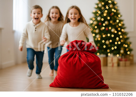 Children excitedly running towards santa's red bag in festive living room with decorated christmas tree in background. concept of holiday magic, christmas excitement, childhood joy Children excitedly running towards santa's red bag in festive living room with decorated christmas tree in background. concept of holiday magic, christmas excitement, childhood joy 131032206