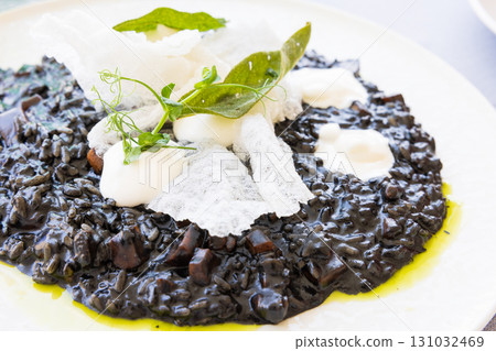 Delicious European squid ink risotto 131032469