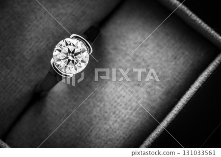 A diamond ring is displayed in a box 131033561