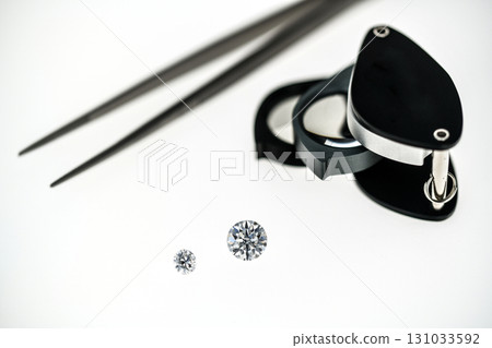 A pair of diamond-tipped tweezers A pair of diamond-tipped tweezers 131033592