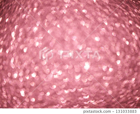 Pink bokeh background with heart shaped light patterns for romantic and festive 131033883