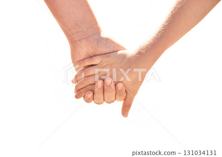 Closeup of two children holding hands signifying friendship and trust Closeup of two children holding hands signifying friendship and trust 131034131