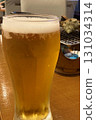 Enjoy a cold beer with grilled turban shells 131034314
