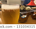 Enjoy a cold beer with grilled turban shells 131034315